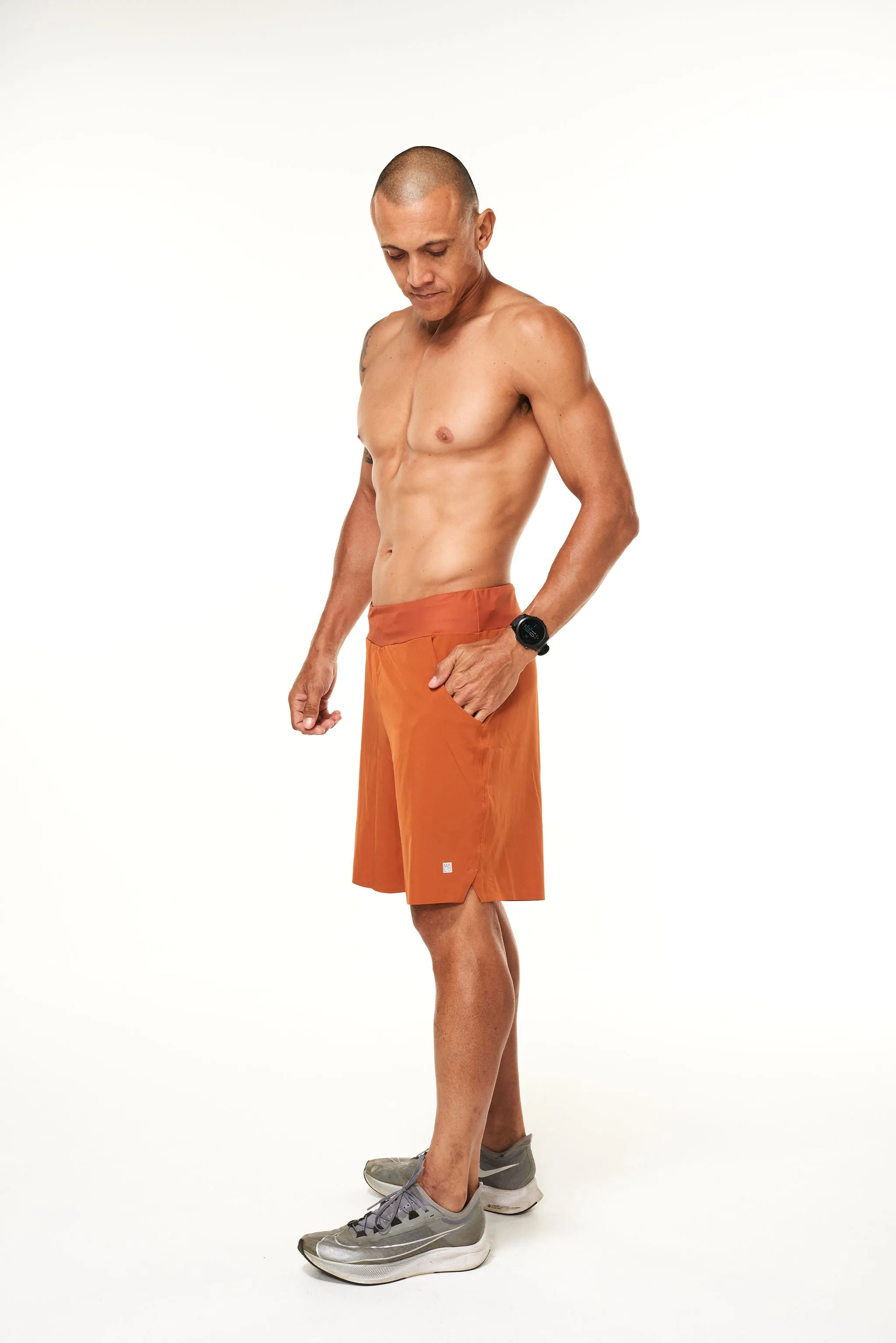 WYN by MALO arvo short (unlined 9.5") - rust